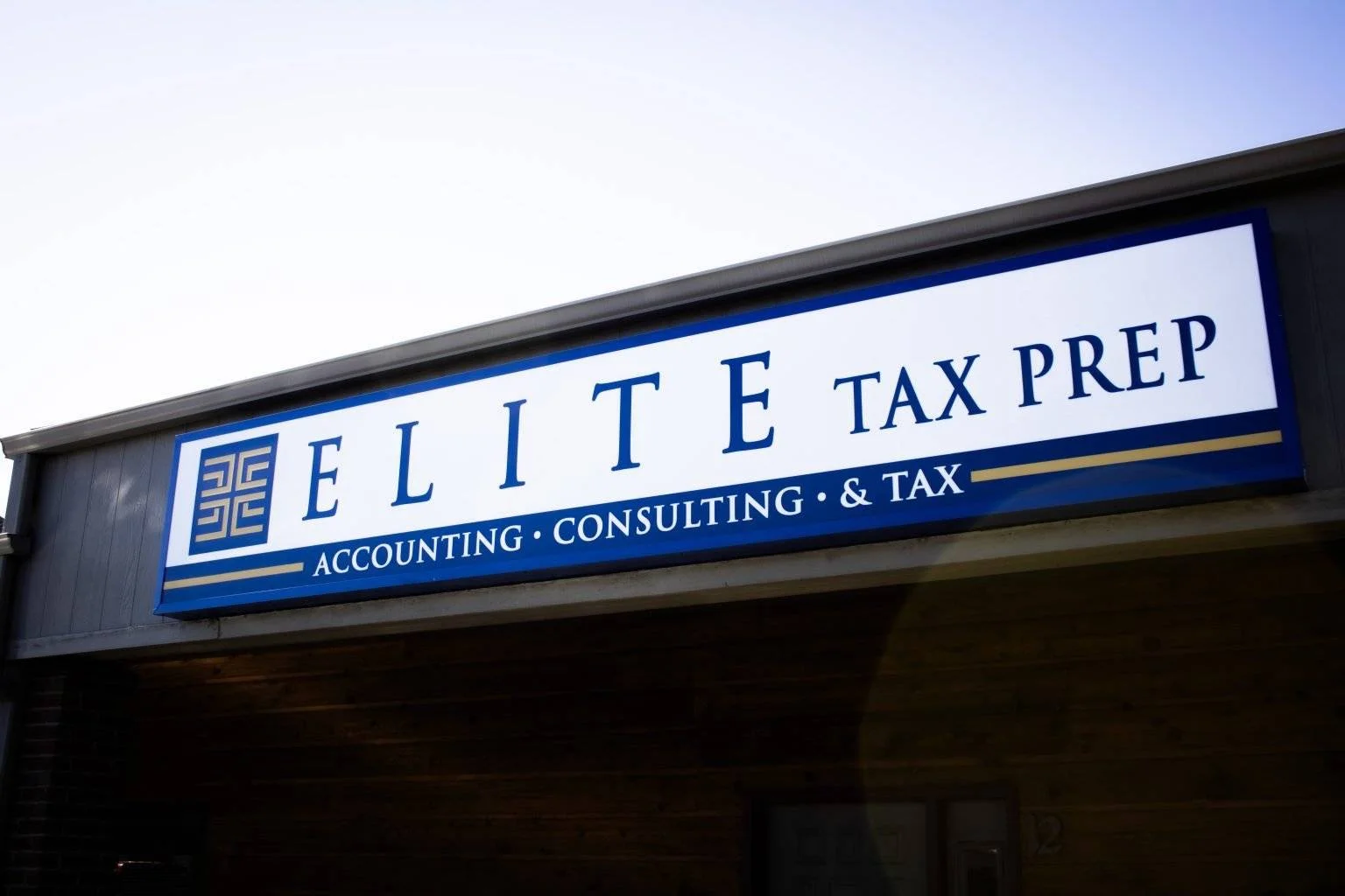 The Elite Accounting, Consulting & Tax awning sign at the Heights location in Billings, MT.